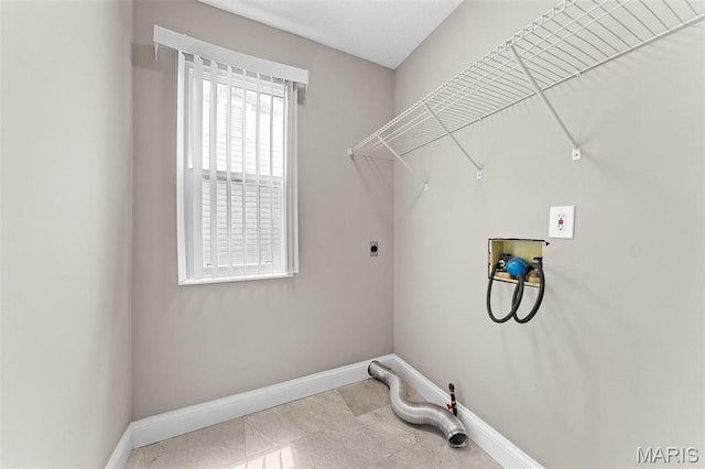 2713 Chapel View Dr, Florissant, MO 63031 - laundry room with washer hookup, baseboards, and hookup for an electric dryer