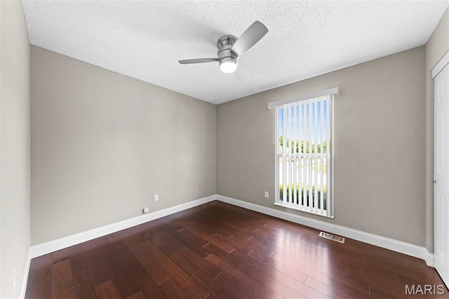 2713 Chapel View Dr, Florissant, MO 63031 - spare room with ceiling fan, wood finished floors, baseboards, and a textured ceiling