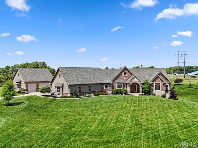 111 Foristell Ridge Ct, Foristell, MO 63348 - view of front of home with a front lawn, an outdoor structure, brick siding, and a garage