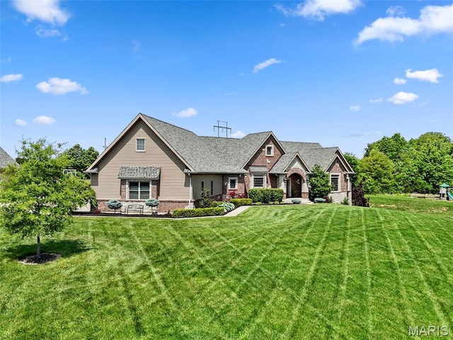 111 Foristell Ridge Ct, Foristell, MO 63348 - view of front facade with brick siding and a front lawn