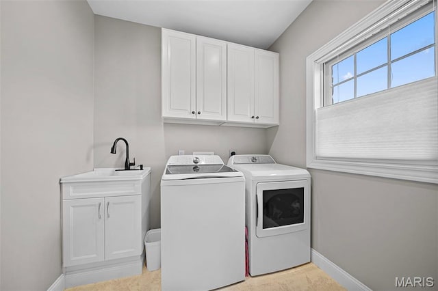 111 Foristell Ridge Ct, Foristell, MO 63348 - washroom with washing machine and dryer, cabinet space, and baseboards