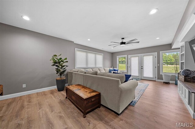 111 Foristell Ridge Ct, Foristell, MO 63348 - living area featuring light wood-style flooring, ceiling fan, baseboards, and recessed lighting