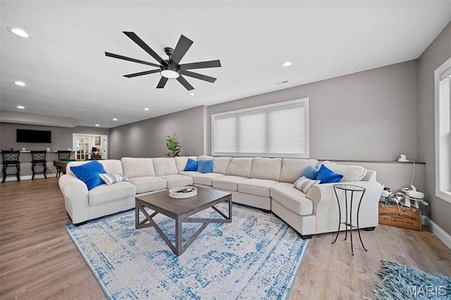 111 Foristell Ridge Ct, Foristell, MO 63348 - living area with wood finished floors, recessed lighting, a ceiling fan, and baseboards