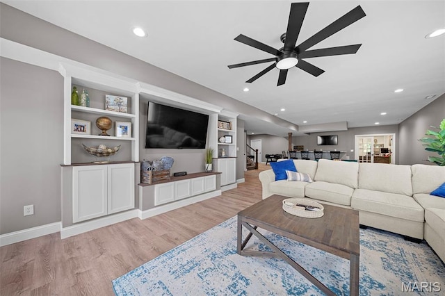 111 Foristell Ridge Ct, Foristell, MO 63348 - living room featuring light wood-style flooring, ceiling fan, baseboards, and recessed lighting