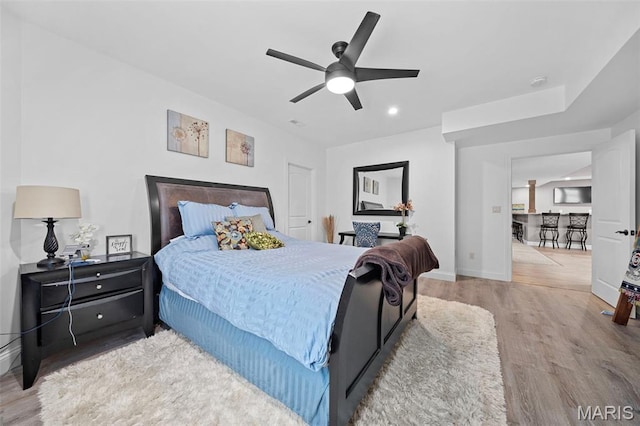 111 Foristell Ridge Ct, Foristell, MO 63348 - bedroom with wood finished floors, baseboards, recessed lighting, and ceiling fan