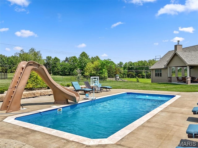 111 Foristell Ridge Ct, Foristell, MO 63348 - view of pool featuring a water slide, a patio area, and view of scattered trees