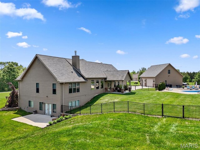 111 Foristell Ridge Ct, Foristell, MO 63348 - rear view of property with a patio, a chimney, and roof with shingles