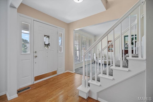 300 Wildberry Ln, Saint Charles, MO 63304 - entrance foyer with stairway and wood finished floors