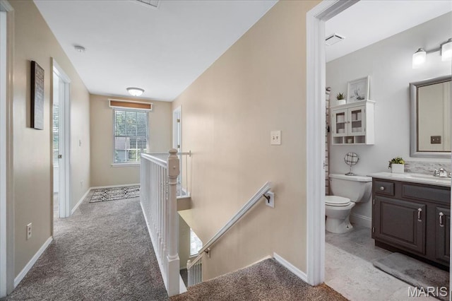 300 Wildberry Ln, Saint Charles, MO 63304 - corridor with an upstairs landing and light colored carpet