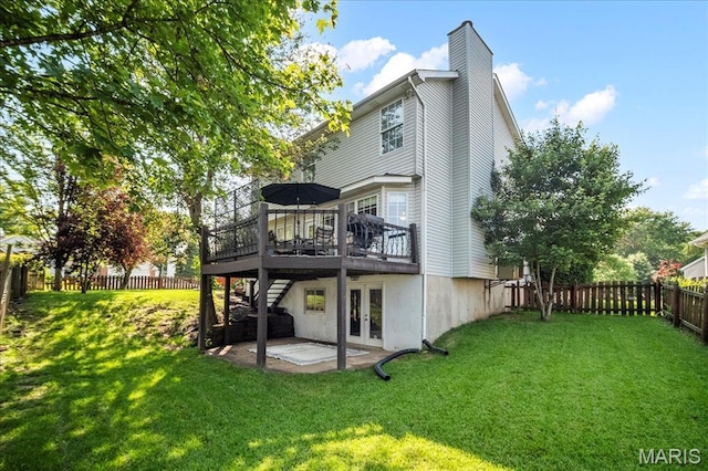 300 Wildberry Ln, Saint Charles, MO 63304 - rear view of property with french doors, a deck, a fenced backyard, a chimney, and a patio area