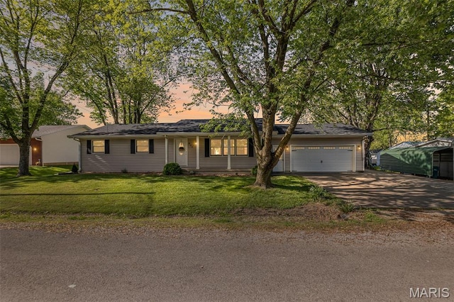 511 E Wilson St, Beckemeyer, IL 62219 - single story home with an attached garage, driveway, and a front yard