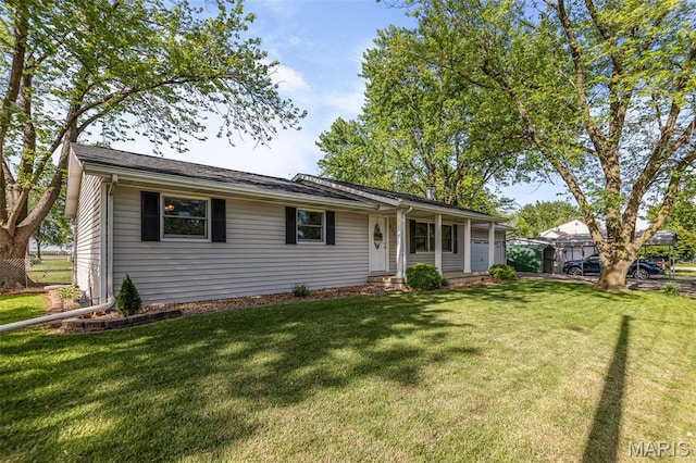 511 E Wilson St, Beckemeyer, IL 62219 - ranch-style house featuring a front lawn and a garage