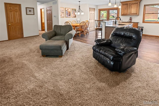 511 E Wilson St, Beckemeyer, IL 62219 - living room featuring dark wood finished floors and baseboards
