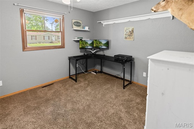 511 E Wilson St, Beckemeyer, IL 62219 - office area with carpet floors, baseboards, and a ceiling fan
