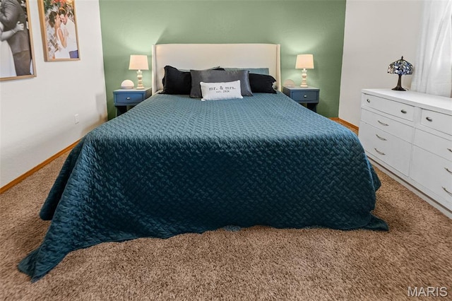 511 E Wilson St, Beckemeyer, IL 62219 - bedroom with carpet flooring and baseboards