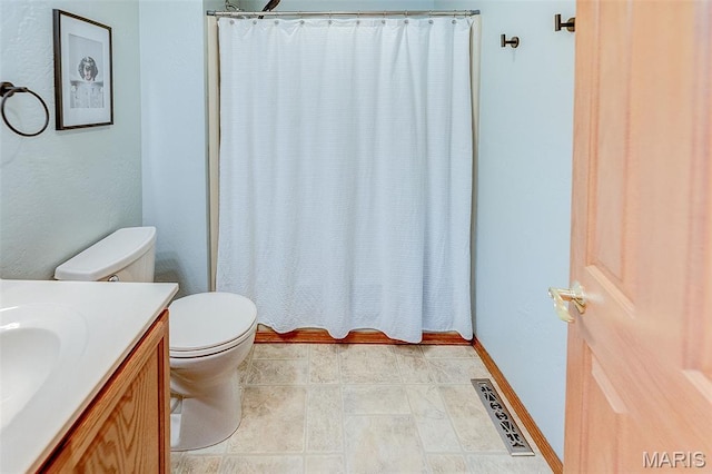 511 E Wilson St, Beckemeyer, IL 62219 - full bathroom with toilet, vanity, and a shower with curtain