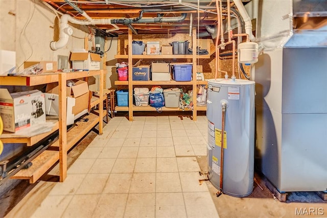 511 E Wilson St, Beckemeyer, IL 62219 - unfinished below grade area with water heater