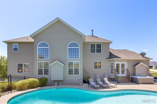 5316 Enchanted Ct, Weldon Spring, MO 63304 - back of property with french doors, a patio area, and entry steps