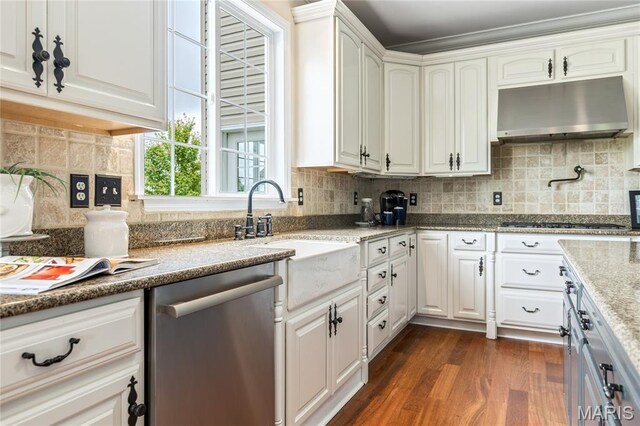 5316 Enchanted Ct, Weldon Spring, MO 63304 - kitchen with dishwasher, under cabinet range hood, white cabinets, and dark wood-style flooring