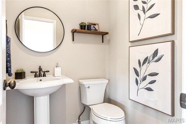5316 Enchanted Ct, Weldon Spring, MO 63304 - half bathroom with toilet and baseboards