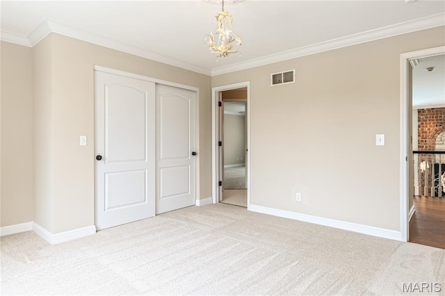 5316 Enchanted Ct, Weldon Spring, MO 63304 - unfurnished bedroom featuring carpet, crown molding, a chandelier, and a closet