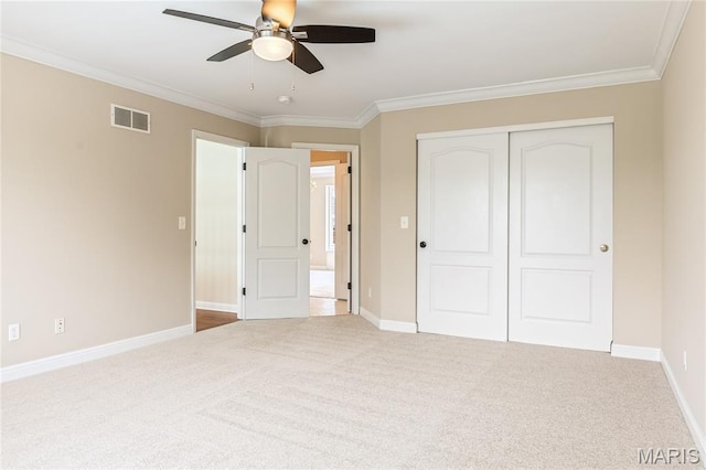 5316 Enchanted Ct, Weldon Spring, MO 63304 - unfurnished bedroom with a closet, carpet flooring, ornamental molding, and a ceiling fan
