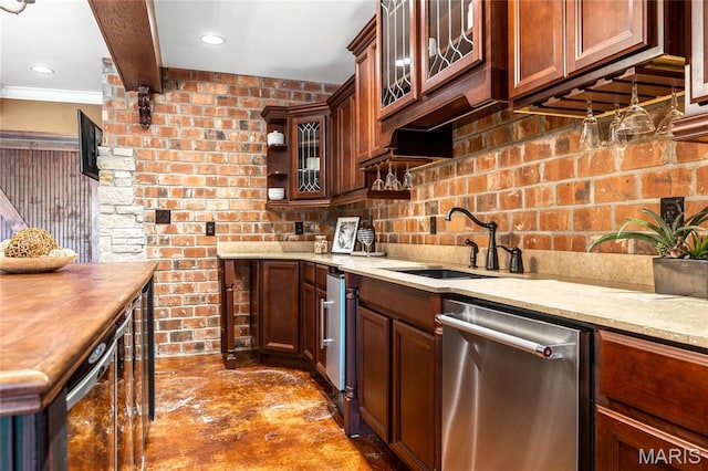 5316 Enchanted Ct, Weldon Spring, MO 63304 - kitchen with stainless steel dishwasher, beam ceiling, glass insert cabinets, recessed lighting, and wooden counters