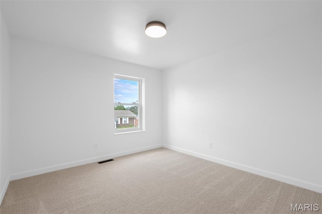 2736 Ashrock Dr, Saint Louis, MO 63129 - unfurnished room with baseboards and carpet floors