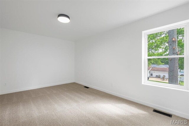 2736 Ashrock Dr, Saint Louis, MO 63129 - unfurnished room with light colored carpet and baseboards