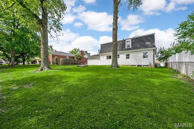2736 Ashrock Dr, Saint Louis, MO 63129 - back of property featuring a shingled roof