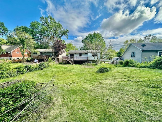 860 Chouteau Ave, Godfrey, IL 62035 - view of yard featuring a wooden deck and stairs