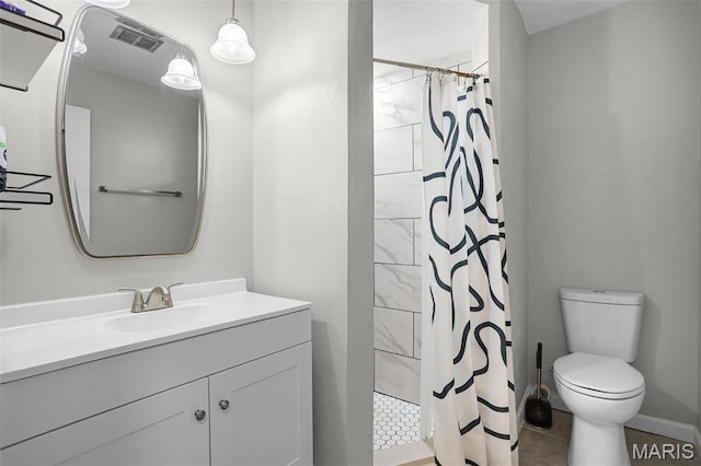 28 French Quarter, Belleville, IL 62223 - full bathroom with toilet, tiled shower, and vanity