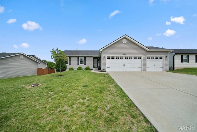 single story home with an attached garage and driveway