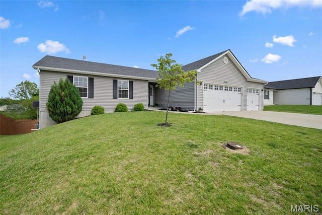 ranch-style house with driveway, a garage, and a front lawn