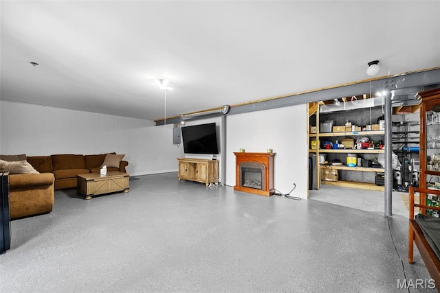 living room with speckled floor and baseboards