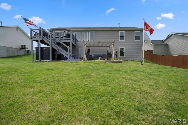 rear view of house featuring a pergola, a deck, and stairway