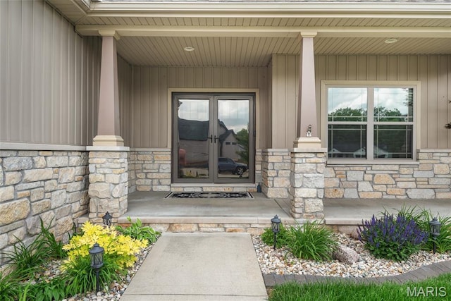1419 Crimson King Way, Troy, IL 62294 - doorway to property with stone siding and a porch