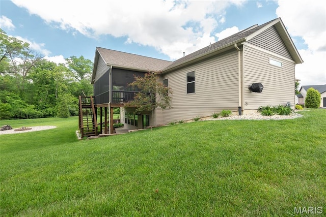 1419 Crimson King Way, Troy, IL 62294 - view of property exterior with a sunroom, a fire pit, stairway, a yard, and a deck