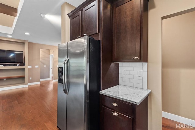 1419 Crimson King Way, Troy, IL 62294 - kitchen with stainless steel fridge with ice dispenser, dark brown cabinetry, baseboards, recessed lighting, and wood finished floors