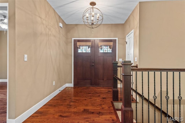 1419 Crimson King Way, Troy, IL 62294 - entrance foyer featuring wood finished floors, a chandelier, and baseboards