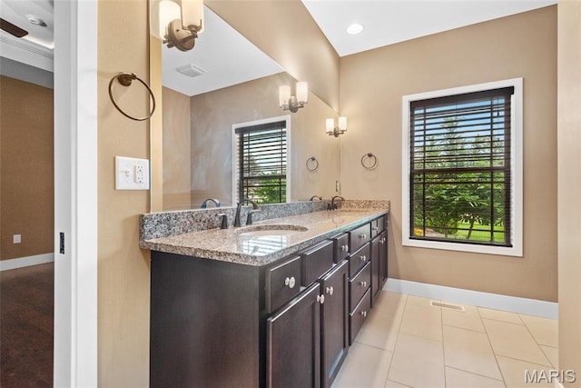 1419 Crimson King Way, Troy, IL 62294 - bathroom with baseboards, double vanity, and tile patterned flooring