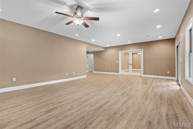 1419 Crimson King Way, Troy, IL 62294 - unfurnished room featuring light wood-style flooring, a ceiling fan, french doors, baseboards, and recessed lighting