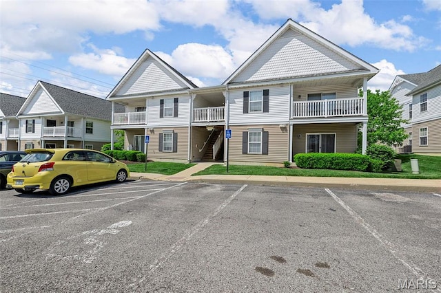 view of front of property with uncovered parking