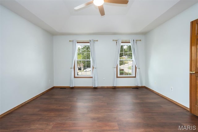 712 Carman Oaks Ct, Manchester, MO 63021 - empty room with a raised ceiling, wood finished floors, and a ceiling fan