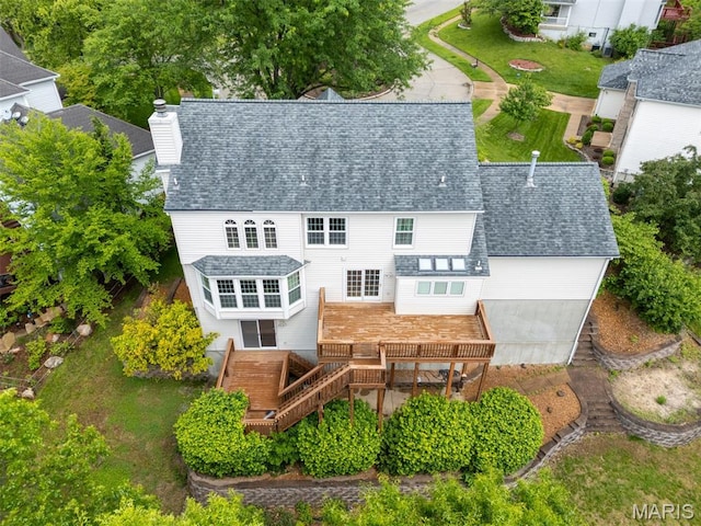 712 Carman Oaks Ct, Manchester, MO 63021 - back of property with roof with shingles, a chimney, stairway, and a deck