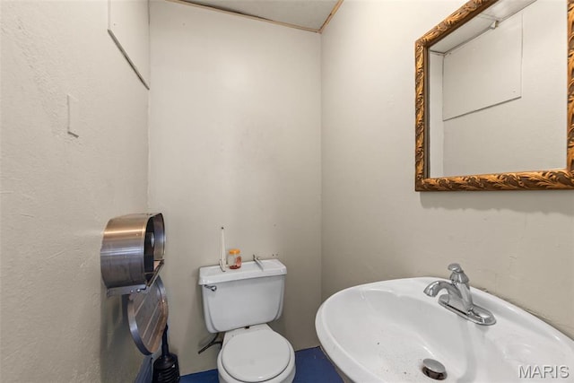 3456 Miami St, Saint Louis, MO 63118 - bathroom with a sink and toilet