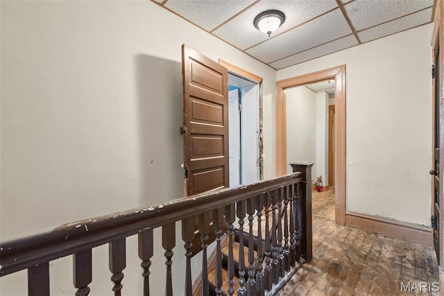 3456 Miami St, Saint Louis, MO 63118 - hall featuring a drop ceiling and an upstairs landing