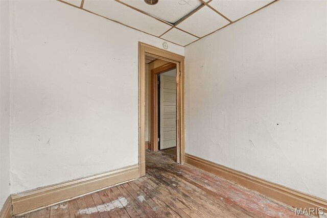 3456 Miami St, Saint Louis, MO 63118 - empty room with wood-type flooring and baseboards