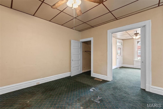 3456 Miami St, Saint Louis, MO 63118 - carpeted spare room featuring ceiling fan and baseboards