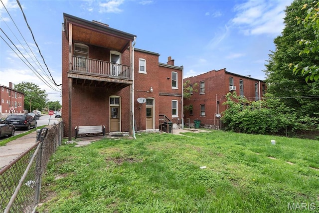 3456 Miami St, Saint Louis, MO 63118 - back of property featuring brick siding and a balcony